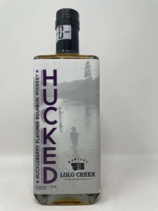 Lolo Creek Distillery Hucked huckleberry flavored bourbon whiskey bottle